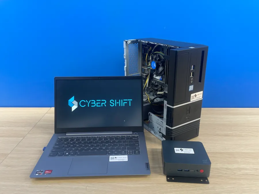 A laptop, desktop and compact PC with Cyber Shift branding A laptop, desktop and compact PC with Cyber Shift branding